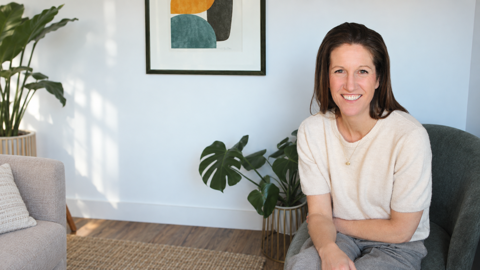 Amy Mills-Guest seated in her counselling office
